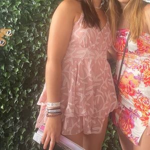 Light pink romper with white details